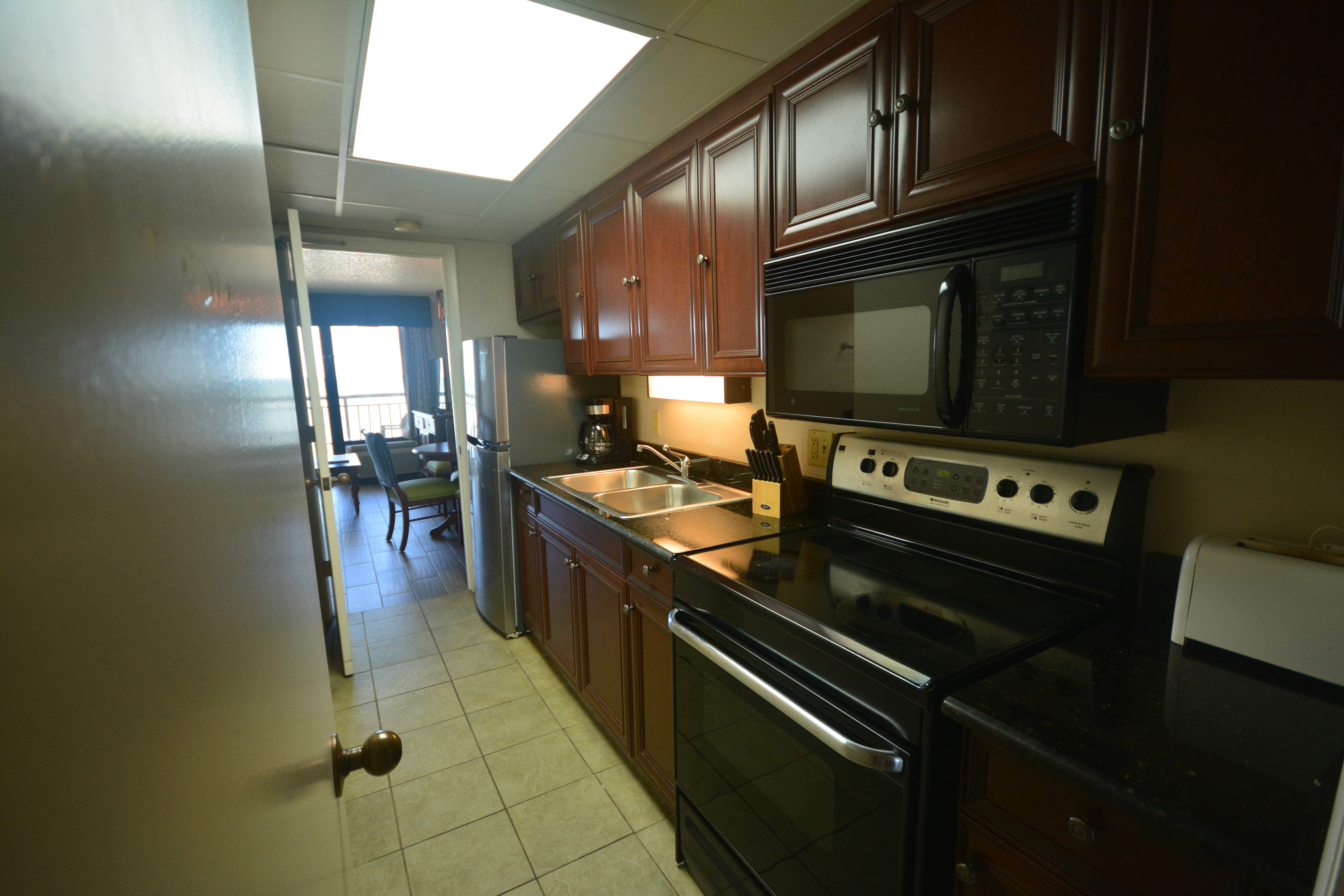 Holiday Inn at the Pavilion - kitchen with granite countertops and new cabinets