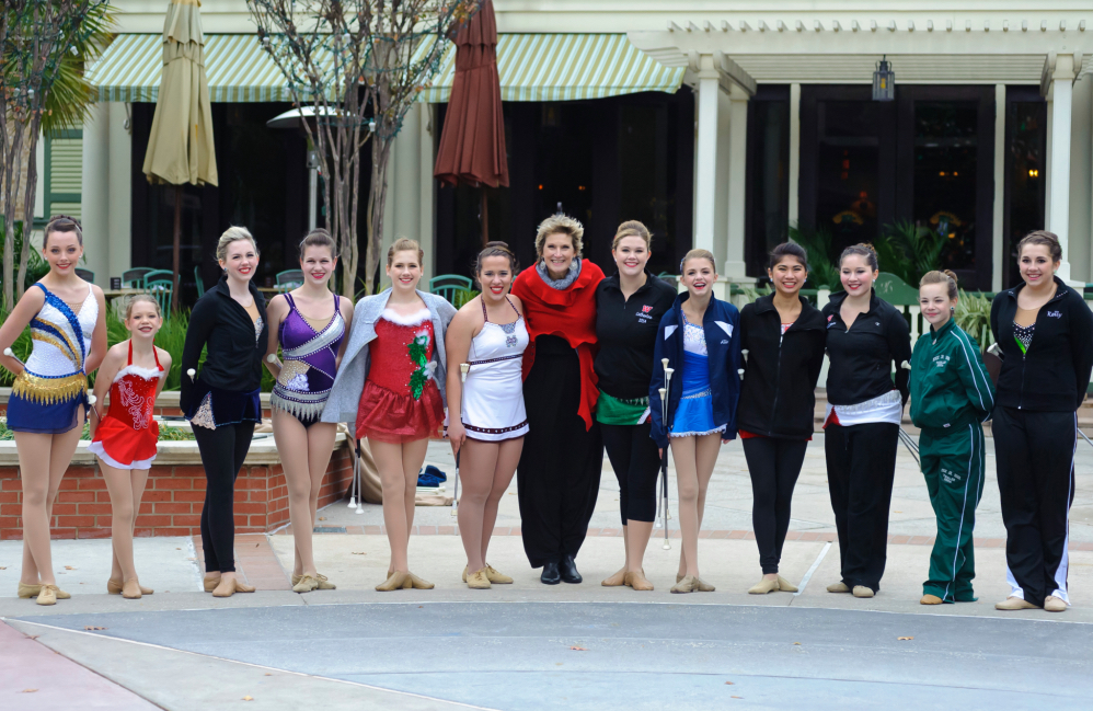 Above are members of Mickey's Majorettes that participated at Market Street in The Woodlands, Texas on Dec 16th, 2012. Pictured left to right are Megan Norton, Isabel Obias, Lindsay Richards, Allie Pellerito Coach & Director Patti Mickey who is holding her grandson Jayce Mickey, Kayli Mickey, Lindsey McCormick, Kristin Baker, Caroline Carothers, and Catherine Potter.