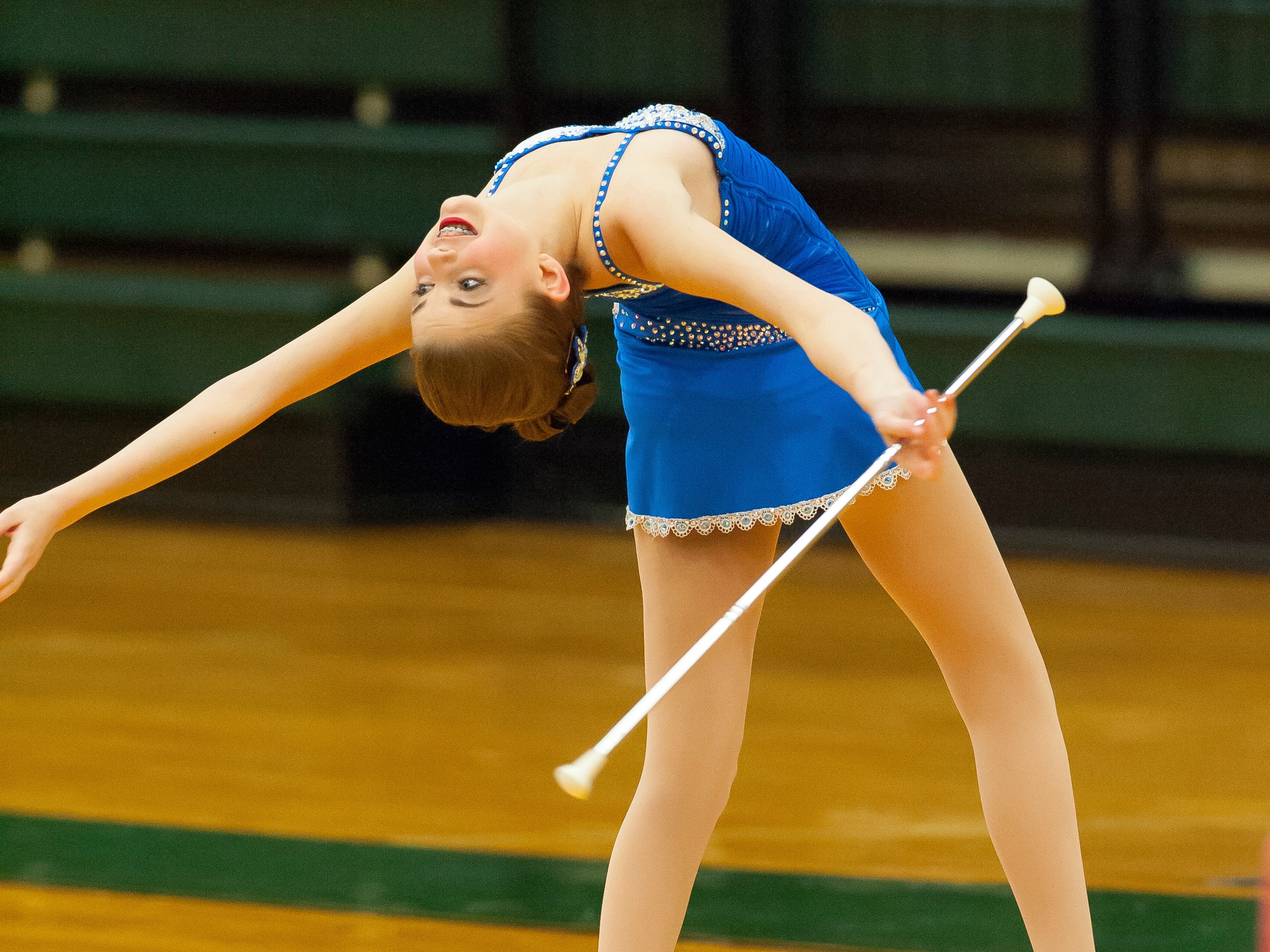 Allie Pellerito twirls at the 2014 Texas State Miss Majorette and Twirling Championshipsheld in DeSoto, Texas