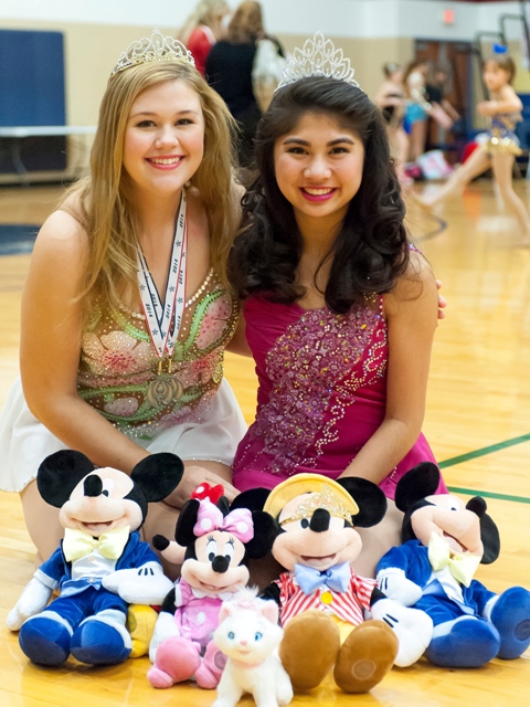 (from left to right), Senior Twirlers    Isabel Obias and Catherine Potter from TWHS, TCU Feature Twirler Kristin Baker, and TWCP    Feature Twirlers Allie Pellerito and Lindsay Richards pose for a picture at the 2013 Southwest    Region Miss Majorette and Twirling Champions held in Ft Worth, Texas.