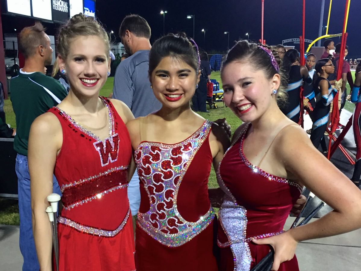 The Three 2014 Feature Twirlers at The Woodlands High School: (L to R) Sophomore Jillian Romaguera, Senior Lindsey McCormick and Sophomore Isabel Obias.