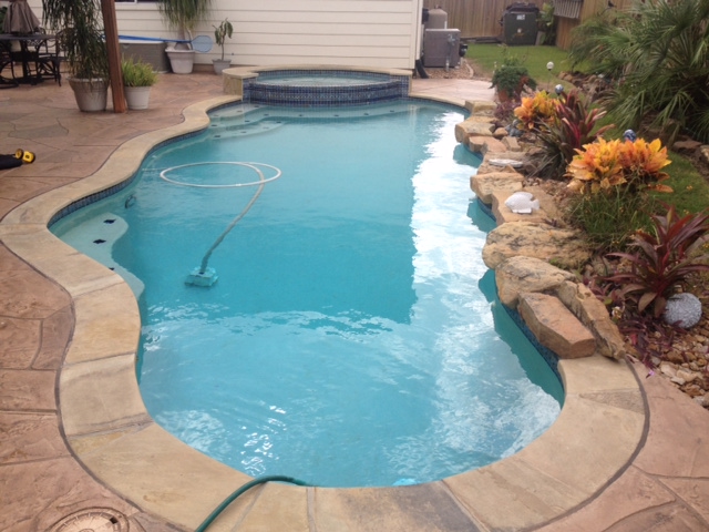 stamped concrete pool coping